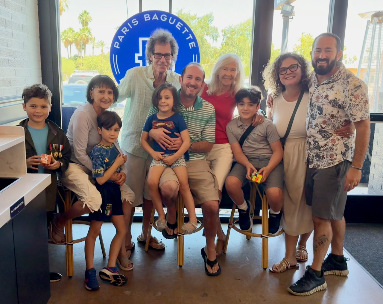 Steve L. with Gail, his sons, their partners and his four grandchildren